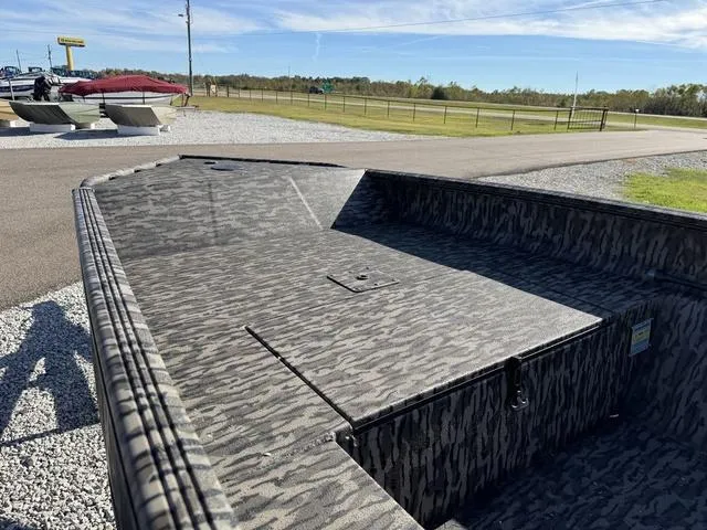 Slide: The Image of 2025 Edge Duck Boats 656 DB MB OG CAMO with camouflage design on display outdoors. - 5