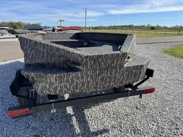 Slide: The Image of 2025 Edge Duck Boats 656 DB MB OG CAMO on gravel lot, showcasing camo design. - 6