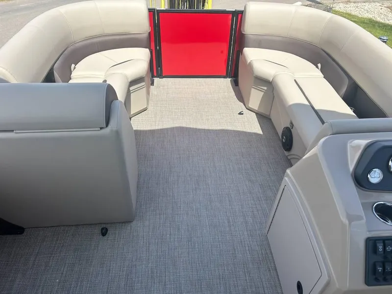 Slide: The Image of 2024 Bentley Pontoons LE 200 Cruise interior with beige seating and red gate. - 4