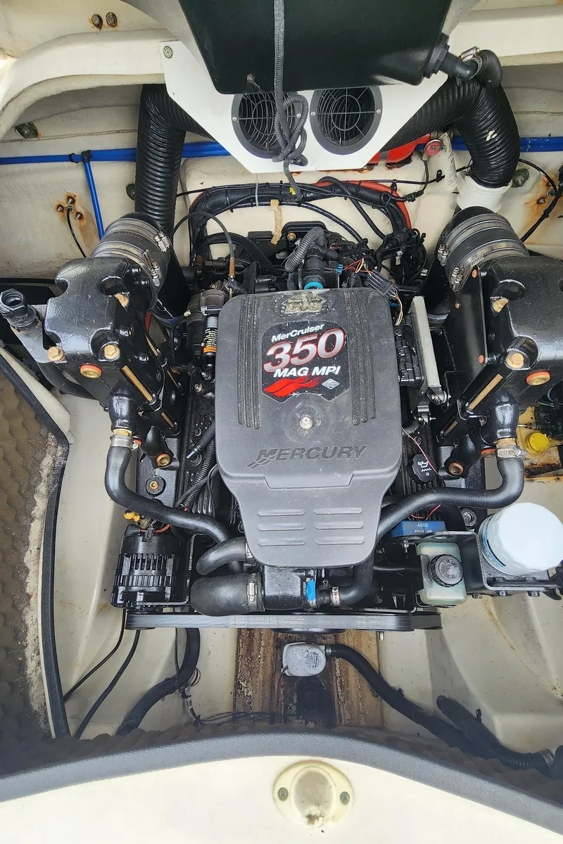 Slide: The Image of 2007 Sea Ray 260 Sundeck engine compartment with Mercury 350 MAG MPI engine. - 16