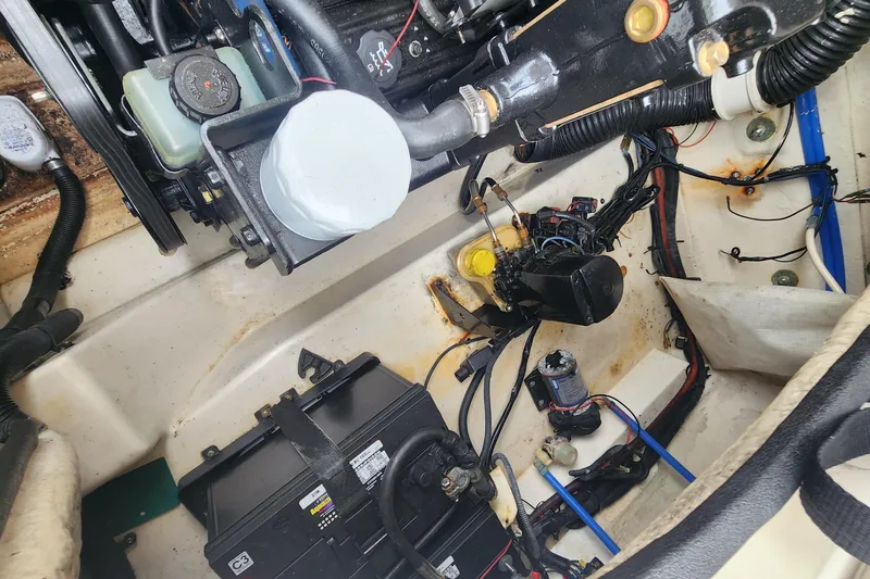 Slide: The Image of Engine compartment of 2007 Sea Ray 260 Sundeck with visible wiring and components. - 17