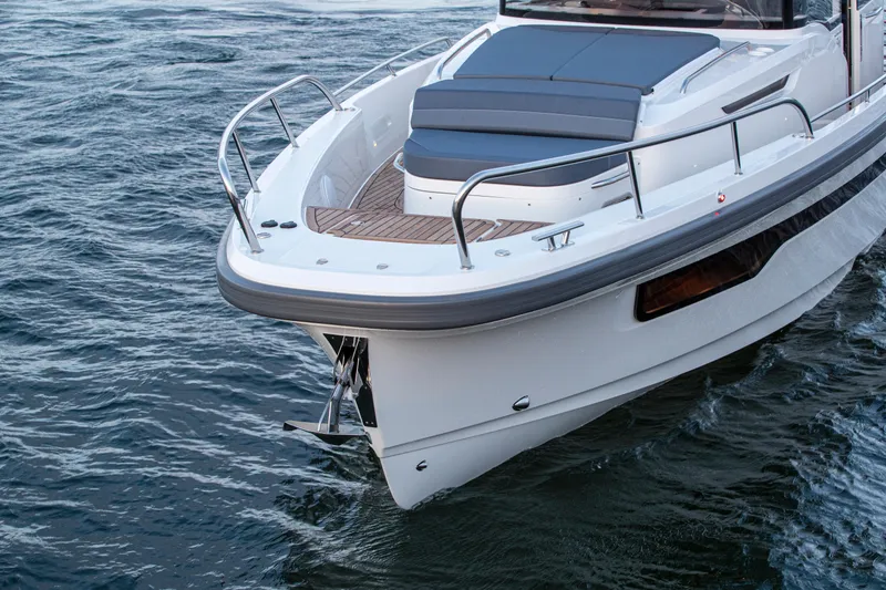 Slide: The Image of Nimbus C11 2025 boat on water, featuring sleek design and modern amenities. - 8