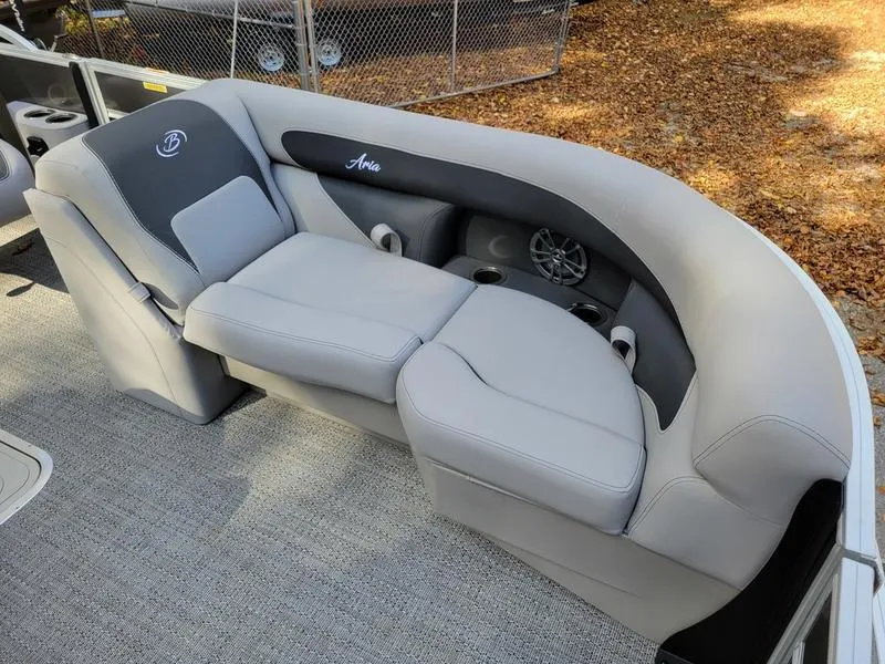 Slide: The Image of 2025 Barletta A20QC boat seating with gray upholstery and cup holders. - 15