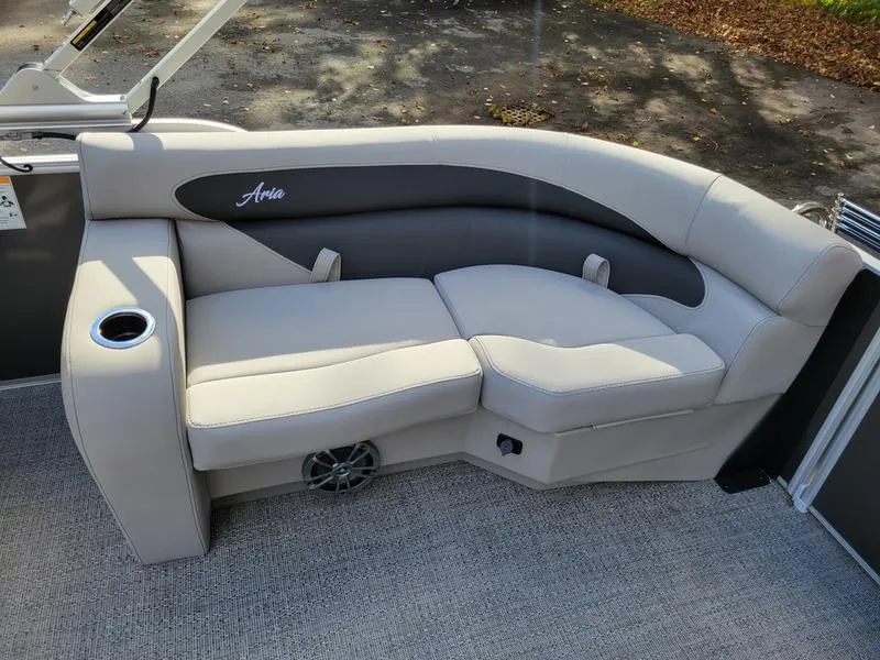 Slide: The Image of 2025 Barletta A20QC boat seating with cup holder and speaker. - 19