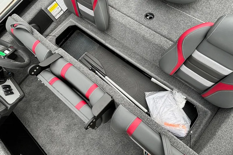 Slide: The Image of 2024 Ranger RT188 boat interior with gray and red seating and storage compartments. - 11