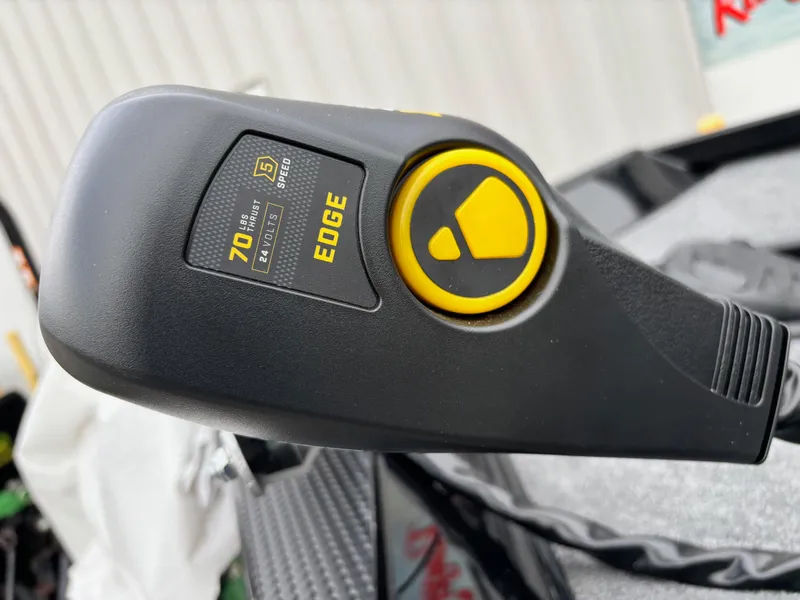 Slide: The Image of Close-up of 2024 Ranger RT188 boat control handle with Edge branding. - 2