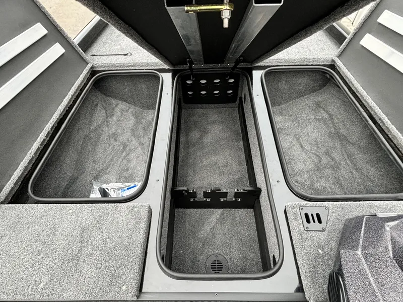 Slide: The Image of 2024 Ranger RT188 boat storage compartments with open lids, showcasing spacious interior. - 6