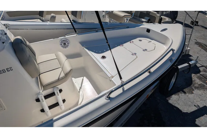 Slide: The Image of 2026 Key West 1720 Center Console boat interior with seating and storage compartments. - 12
