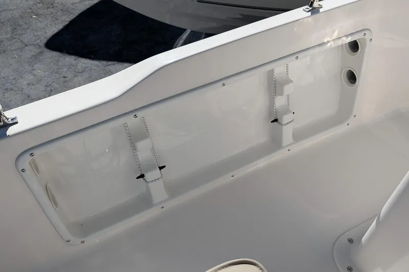 Slide: The Image of 2026 Key West 1720 Center Console boat interior detail, featuring sleek white design. - 8