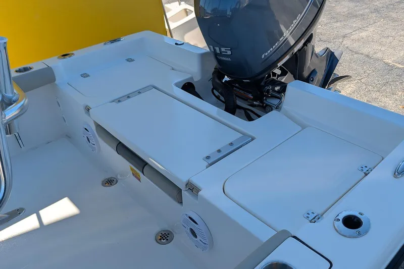 Slide: The Image of 2026 Key West 179 FS boat interior with Yamaha outboard motor. - 6