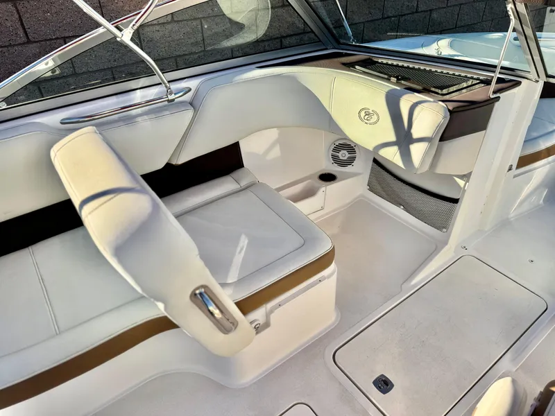Slide: The Image of 2017 Cobalt 220S boat interior with white seating and sleek design. - 12
