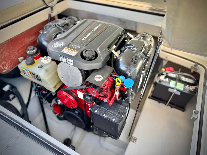 Slide: The Image of 2017 Cobalt 220S boat engine compartment with Volvo Penta engine. - 20