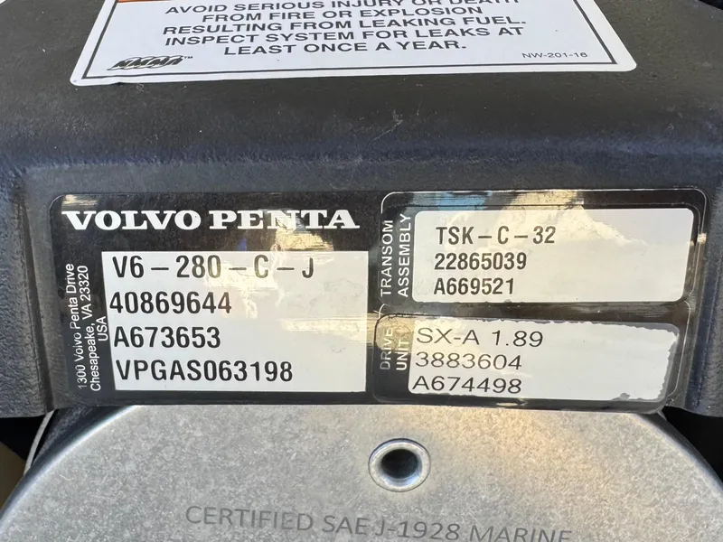 Slide: The Image of Volvo Penta engine label on 2017 Cobalt 220S boat, displaying model and serial numbers. - 21