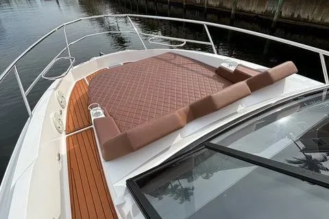 Slide: The Image of 2023 NX Boats 360 with luxurious deck seating and sleek design. - 28