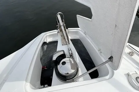 Slide: The Image of Anchor compartment of 2023 NX Boats 360, open hatch, sleek design. - 31