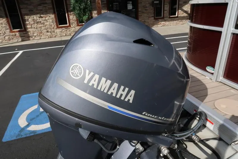Slide: The Image of Yamaha outboard motor on a 2018 Bennington 23SPDX pontoon boat. - 11