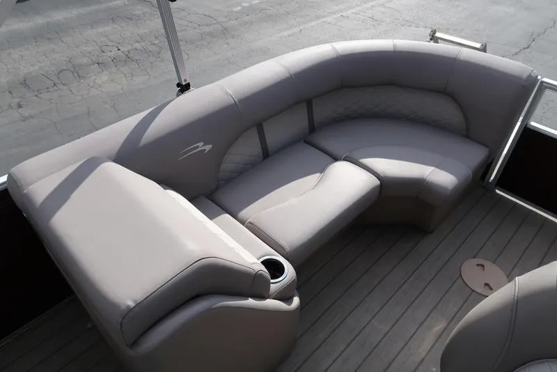 Slide: The Image of 2018 Bennington 23SPDXP pontoon boat interior with plush seating and cup holder. - 27