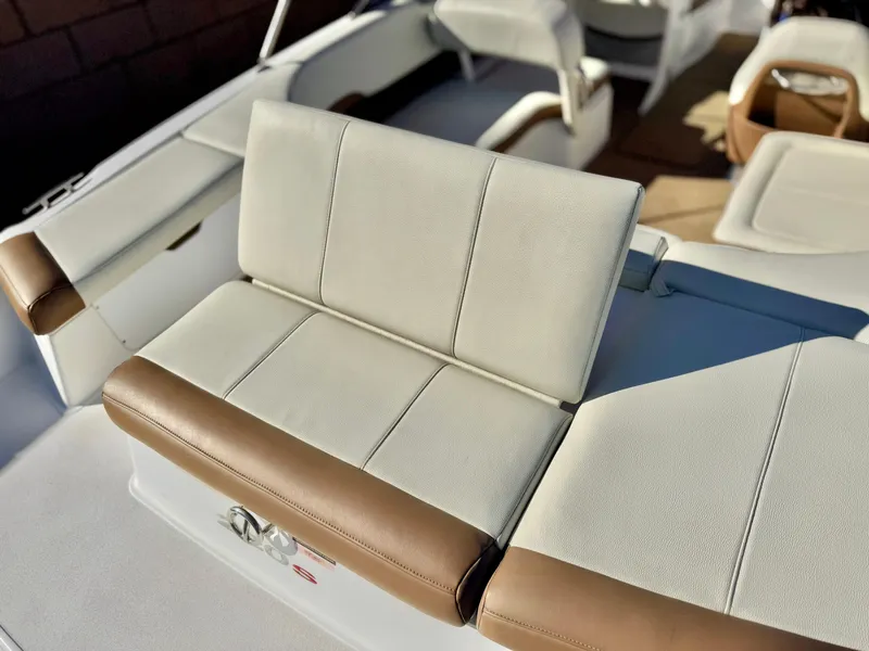 Slide: The Image of Cobalt 220S 2017 boat interior with beige and brown seating. - 22