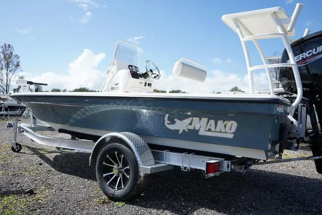 Slide: The Image of 2025 Mako 18 LTS boat on trailer, side view, outdoors. - 6