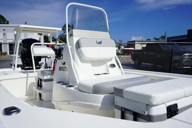 Slide: The Image of 2025 Mako 18 LTS boat with sleek design and comfortable seating. - 9