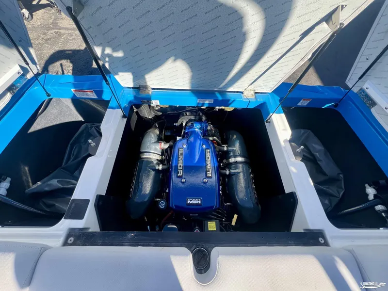Slide: The Image of 2018 MasterCraft XT22 engine compartment with Ilmor MPI engine. - 11
