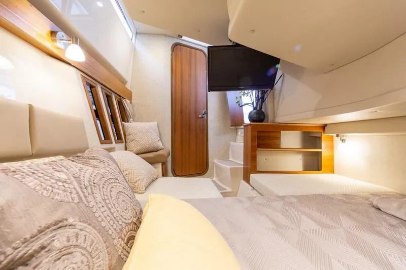 Slide: The Image of Luxurious interior of 2025 Ranger Tugs 43 Command Bridge yacht cabin. - 45