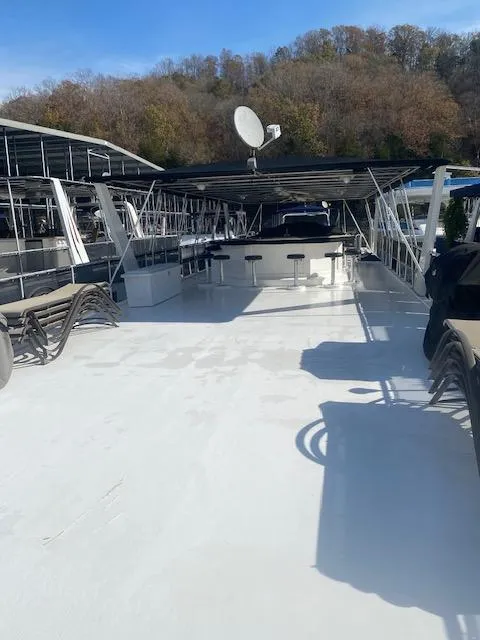 Slide: The Image of 2000 Sumerset 18x85 Houseboat with spacious deck and seating area. - 29