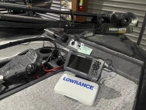 Slide: The Image of 2024 Tracker Pro Team 175 TXW boat with Lowrance fishfinder and Minn Kota trolling motor. - 18