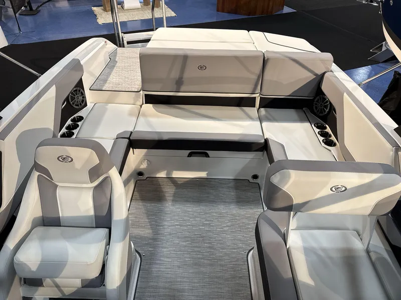 Slide: The Image of Interior of 2025 Cobalt CS22 boat with modern seating and cup holders. - 15