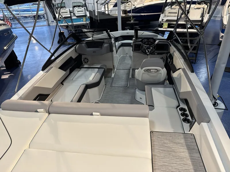 Slide: The Image of 2025 Cobalt CS22 boat interior with spacious seating and modern design. - 7