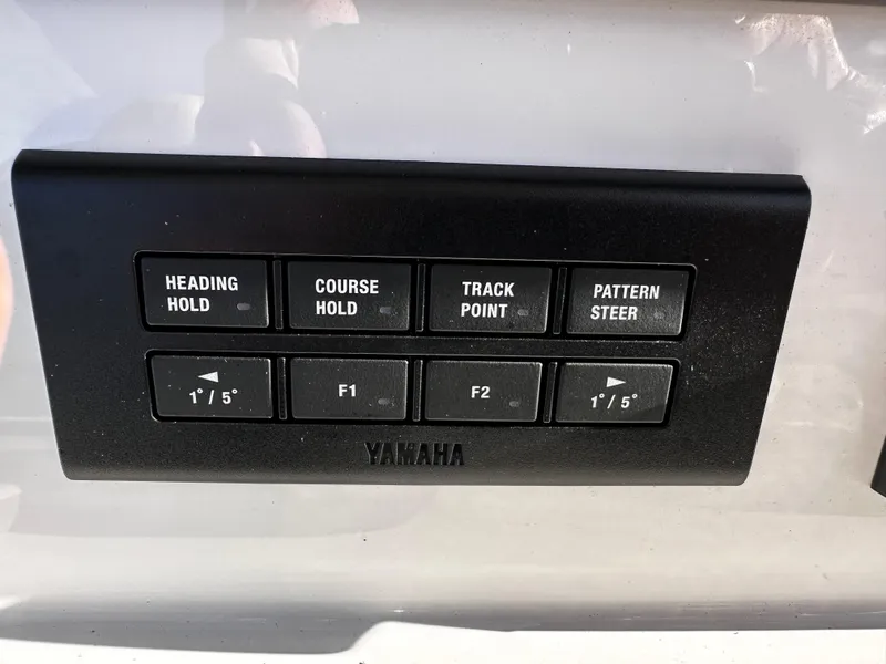 Slide: The Image of Control panel on 2025 Sea Fox 328 Commander boat with Yamaha navigation buttons. - 15