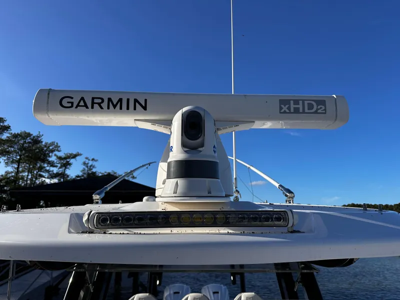 Slide: The Image of Garmin xHD2 radar on 2025 Sea Fox 328 Commander boat under clear blue sky. - 20