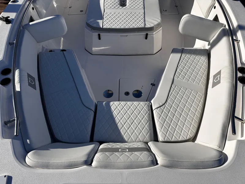 Slide: The Image of 2025 Sea Fox 328 Commander boat interior with quilted seating and modern design. - 22