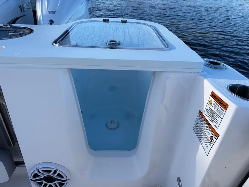 Slide: The Image of 2025 Sea Fox 328 Commander boat with livewell and storage compartment. - 27