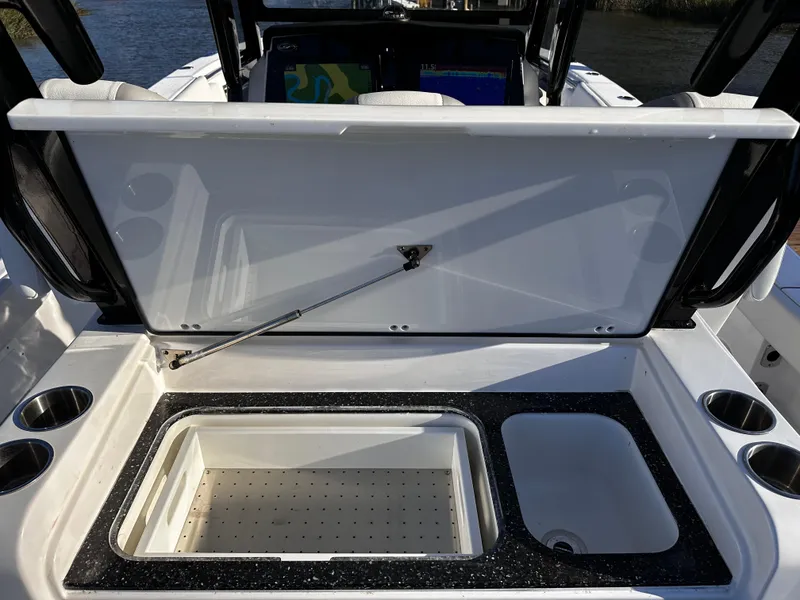 Slide: The Image of Open storage compartment on 2025 Sea Fox 328 Commander boat. - 29
