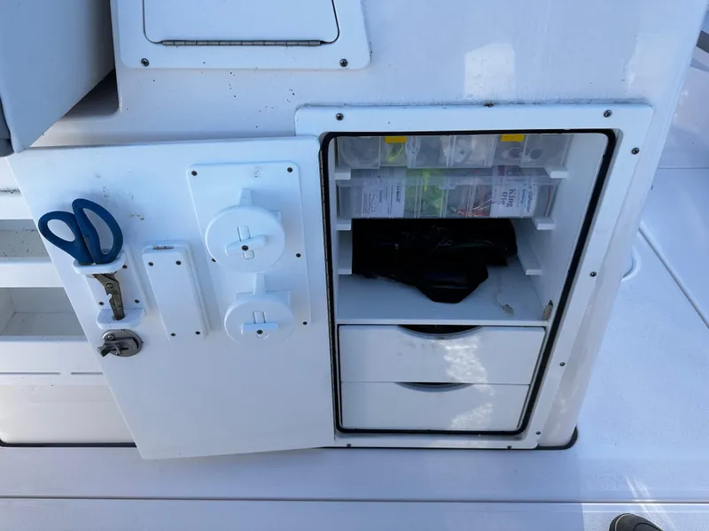 Slide: The Image of Fishing tackle storage on 2025 Sea Fox 328 Commander boat. - 33