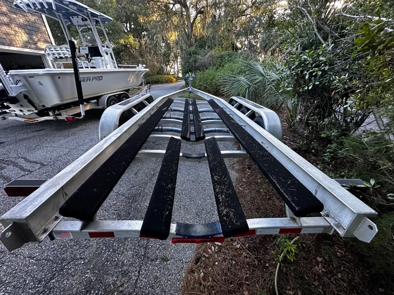 Slide: The Image of Boat trailer for 2025 Sea Fox 328 Commander, parked outdoors. - 43