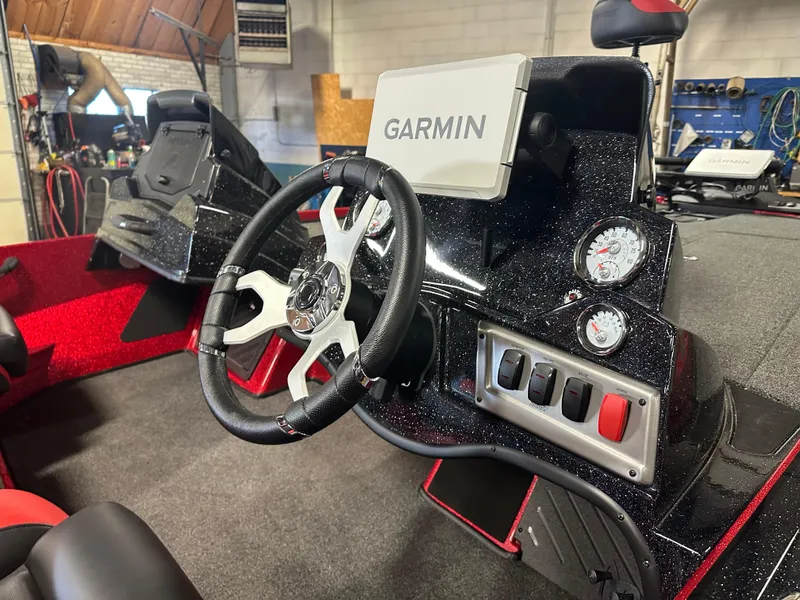 Slide: The Image of Interior of 2025 Nitro Z18 Pro boat with Garmin navigation system. - 11