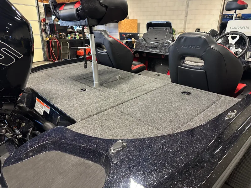 Slide: The Image of 2025 Nitro Z18 Pro boat interior with seating and equipment. - 13