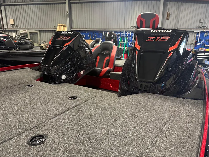 Slide: The Image of 2025 Nitro Z18 Pro boat interior with dual seats and sleek design. - 17