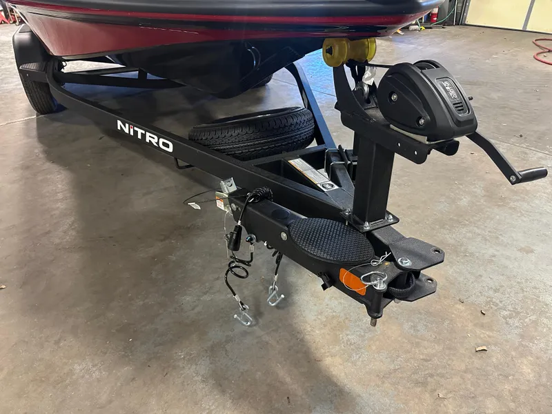 Slide: The Image of Trailer hitch of a 2025 Nitro Z18 Pro boat, featuring sturdy construction and safety chains. - 19