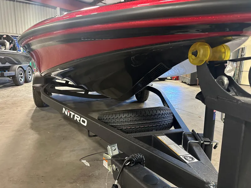 Slide: The Image of 2025 Nitro Z18 Pro boat on trailer in garage setting. - 20