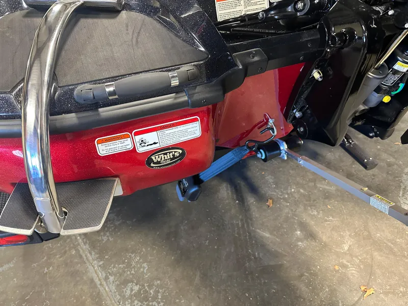 Slide: The Image of 2025 Nitro Z18 Pro boat rear view with trailer attachment and safety labels. - 21