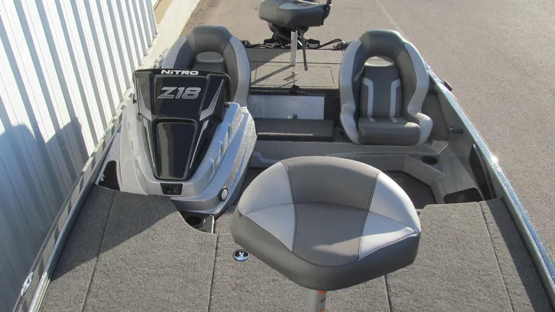 Slide: The Image of 2025 Nitro Z18 Pro boat interior with seating and motor. - 12