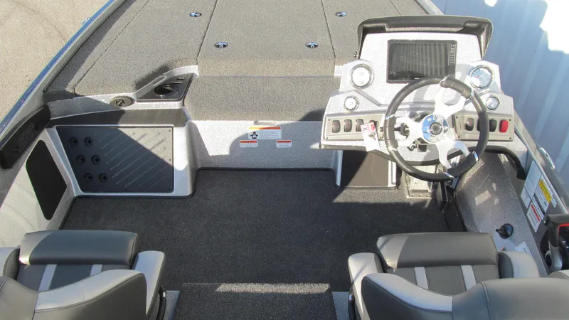 Slide: The Image of 2025 Nitro Z18 Pro boat interior with steering wheel and seating. - 5