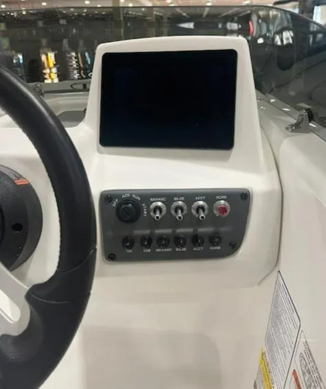 Slide: The Image of Dashboard of 2025 Tahoe T16 boat with control panel and display screen. - 7