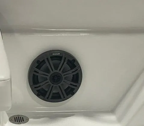 Slide: The Image of 2025 Tahoe T16 boat speaker system in white interior. - 8