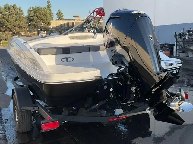 Slide: The Image of 2025 Tahoe T18 boat interior with spacious seating and sleek design. - 7