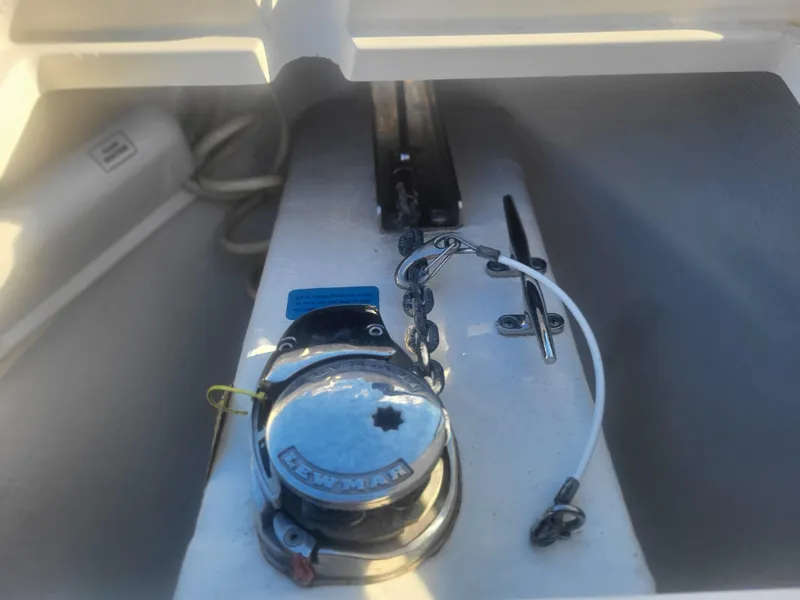 Slide: The Image of 2016 Cobia 277 Center Console anchor locker with Lewmar windlass. - 21