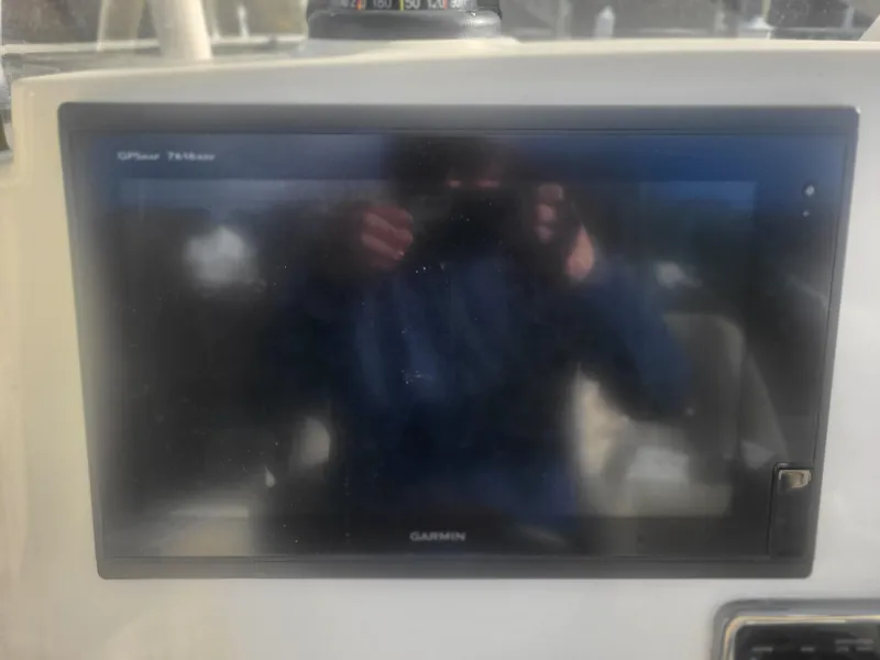 Slide: The Image of Garmin GPS display on 2016 Cobia 277 Center Console boat dashboard. - 42
